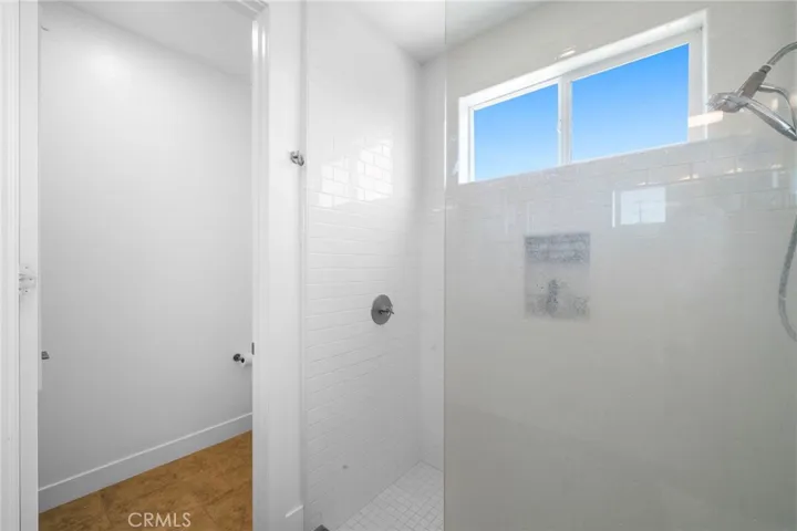 Large walk-in shower in primary bathroom