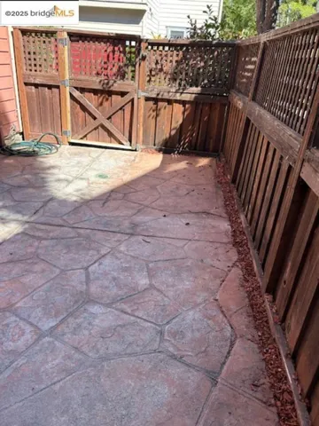 View of patio / terrace with a gate