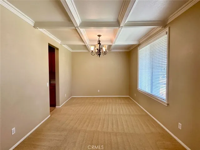  
Formal Dining Room with coffered Ceiling