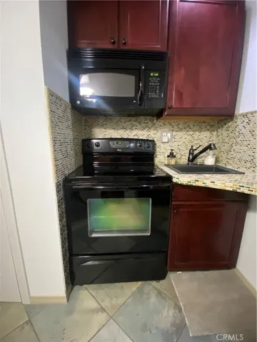 Shared Kitchen.  Electric stove and microwave