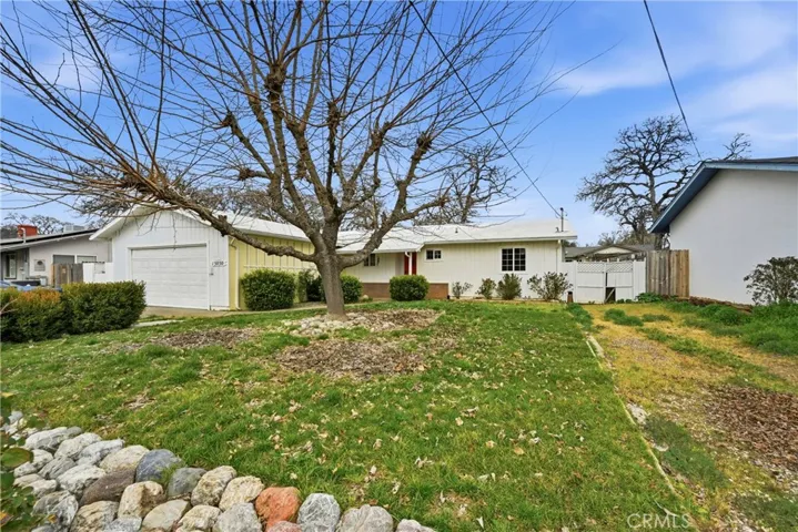 Front yard and room for extra parking along side of yard
