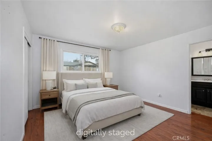 Digitally staged primary bedroom