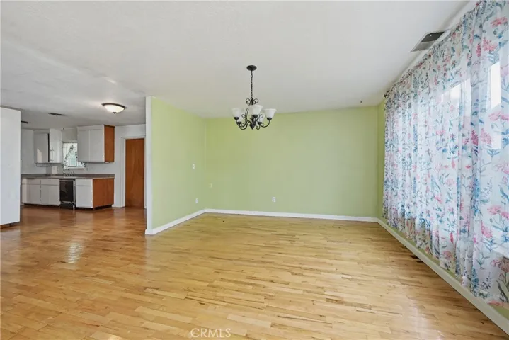Dining area opens to breakfast nook and kitchen