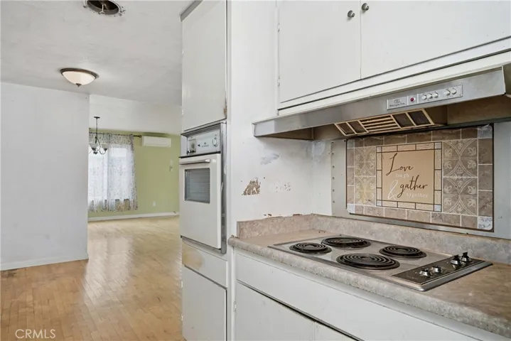 Kitchen opens to breakfast nook and dining room