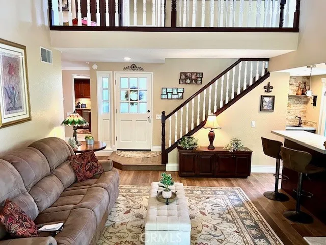 Entry and livingroom.   Loft area above