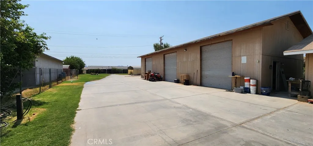 Driveway looking past RV garage/shop toward main house