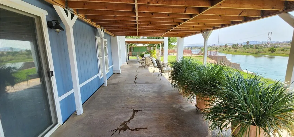 Main house covered front patio looking south to north