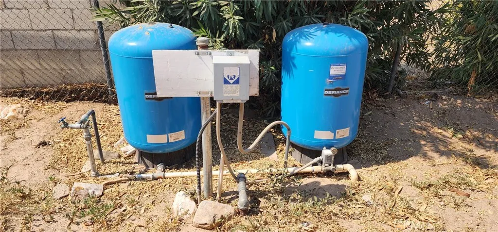 Well storage tanks for both houses