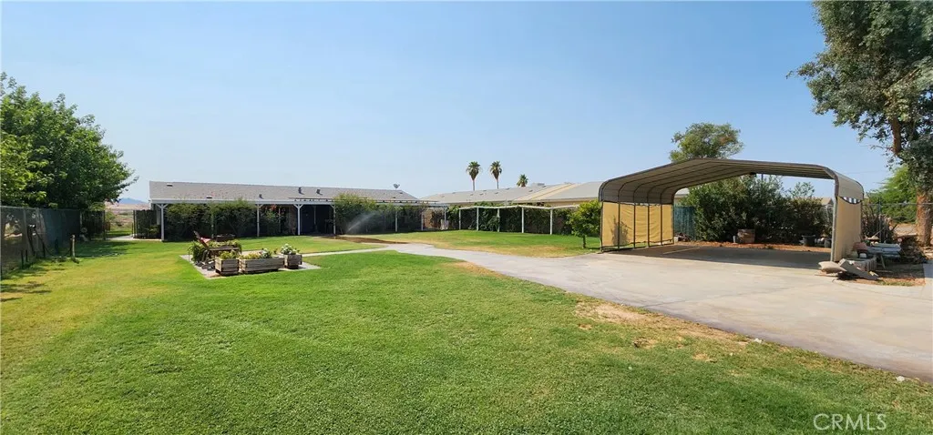 Yard facing back side of main house