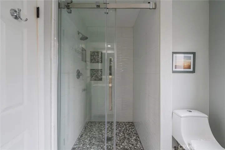 Nice walk in shower in primary bathroom