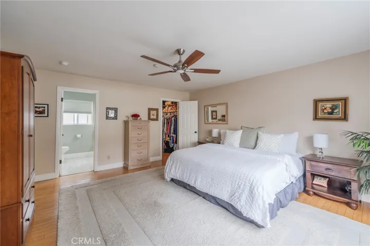King sized bedroom with walk in closet & en suite bath