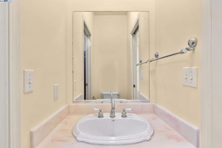 1/2 bath sink, adjacent to pantry/ mudroom