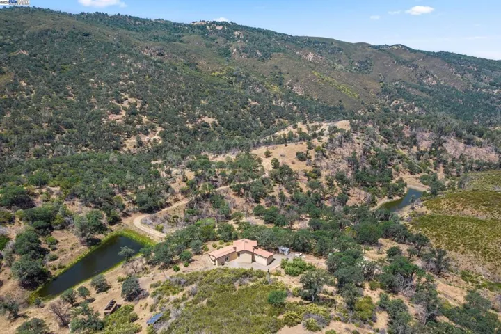 Aerial , back of house and 2 ponds