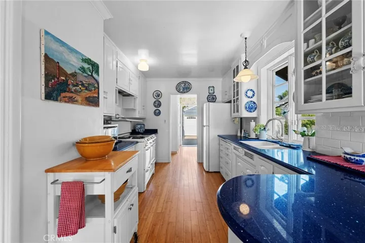 Quartz counters and original cabinets.