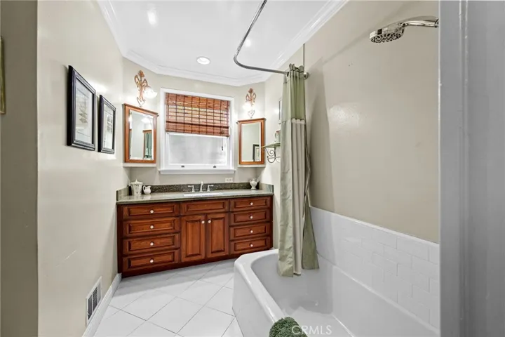 Main bath was remodeled with a vintage feel.