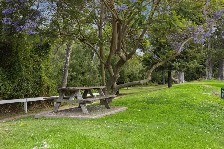 Along the creek at the back of the community.