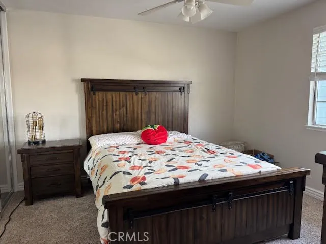 Right front bedroom with ceiling fan
