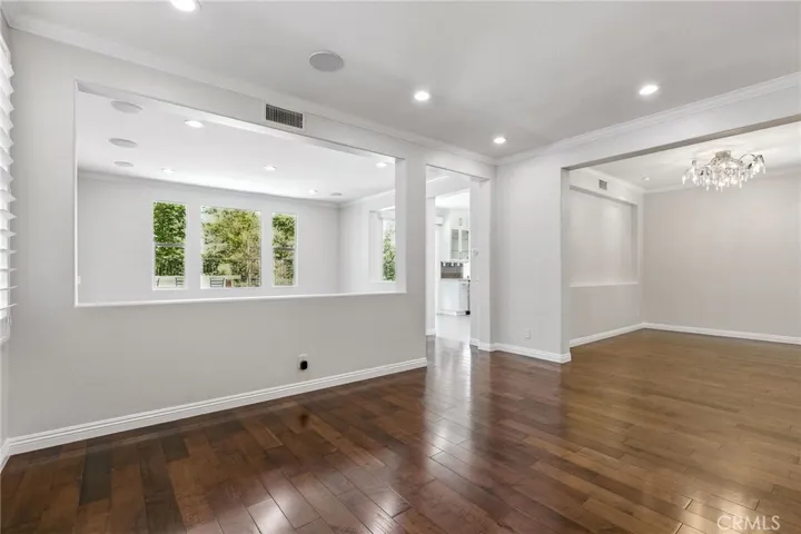 A closer look the family room and fabulous formal dining room.