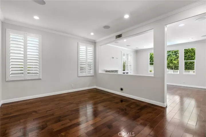 From  front entry door, view of living room and family room.