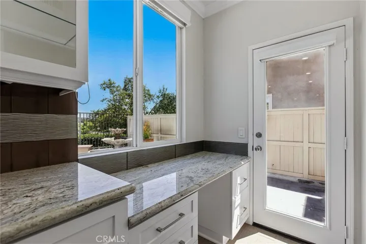 A built in desk with view in the kitchen.