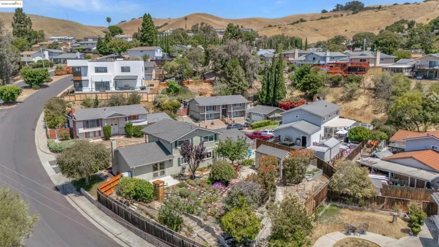 Aerial view of residential area with mountains