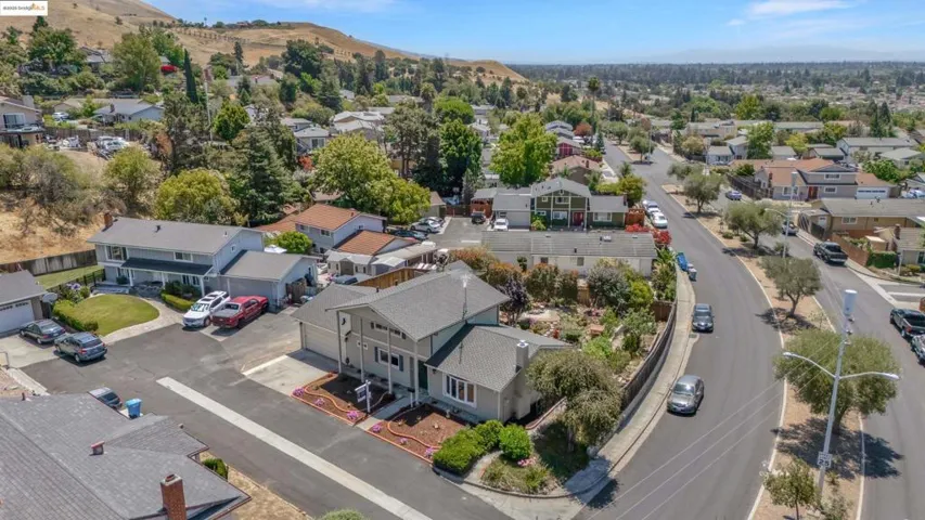 Aerial view of residential area with a mountain backdrop