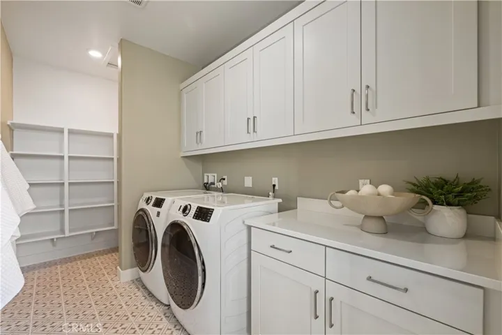 Laundry Room.Photo is of model - not actual  homesite.