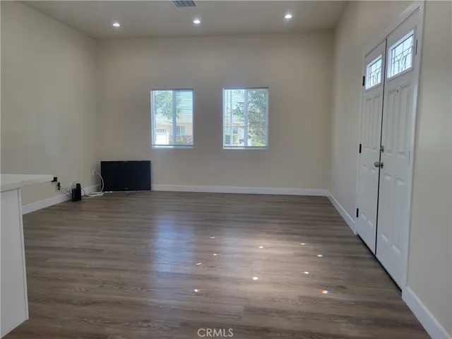 open concept living dining kitchen