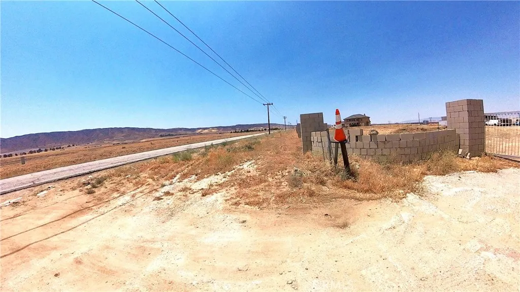 Paved road in front of the lot