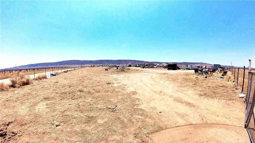 Property lot surrounded by metal wire gate