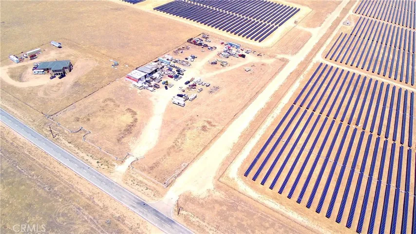Property lot surrounding with neighbor and solar panels and front of road