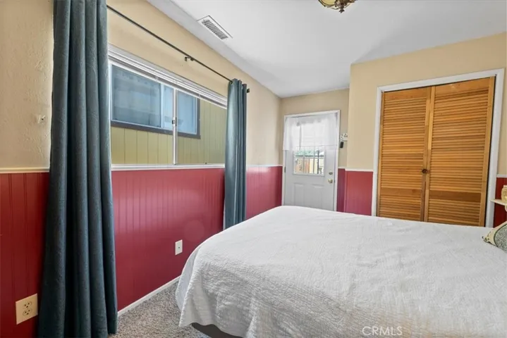 2nd Bedroom with access to the back yard