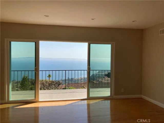 Living room leads to expansive deck with views to take your breath away.