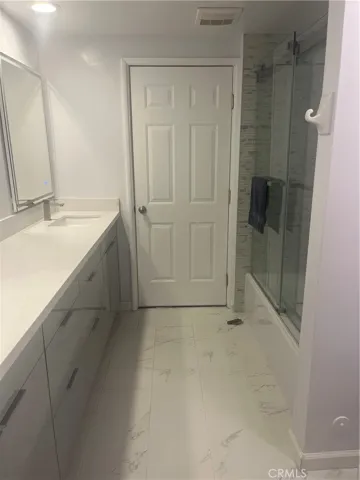 Updated downstairs bathroom that leads out to the pool.