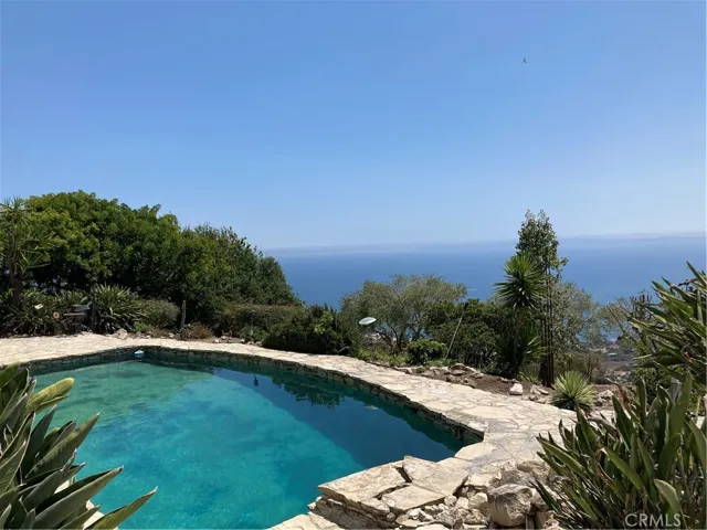 Large outdoor space and pool.