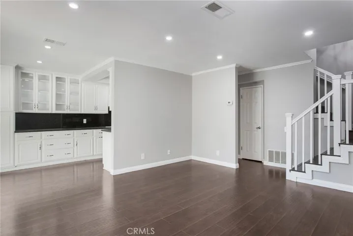 Newly refreshed with flooring, paint, and can lighting throughout.