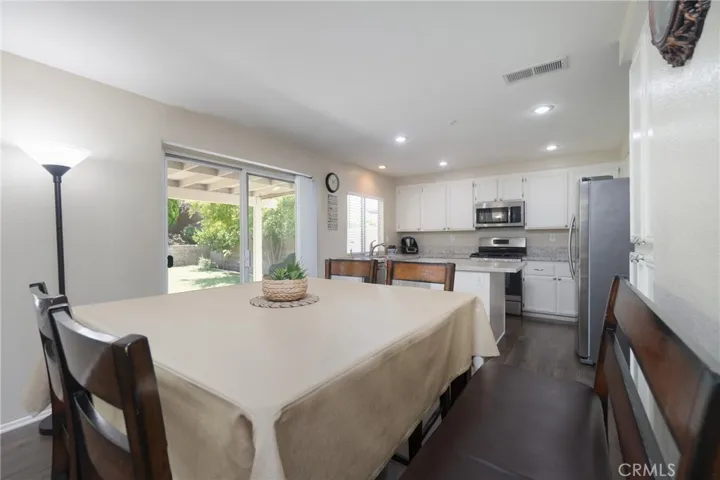 Breakfast area with sliding glass door to the patio