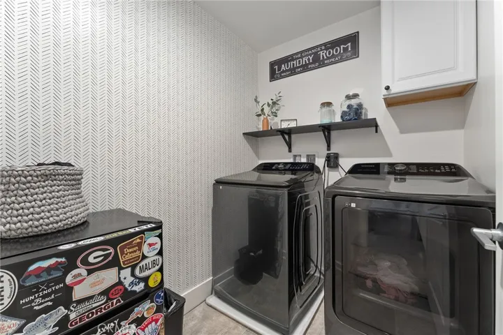 Spacious upstairs laundry. One could place a small refrigerator for convenience if desired like the current owners.