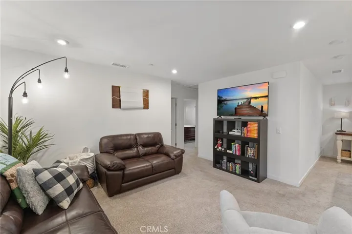 Upstairs loft amidst the bedrooms could be a 4th bedroom option if needed. Just add walls and a door.