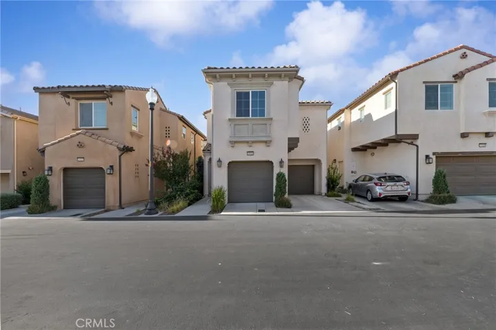 2 car garage, tile roof, solar is leased at $200/month. Stand alone, no shared walls.