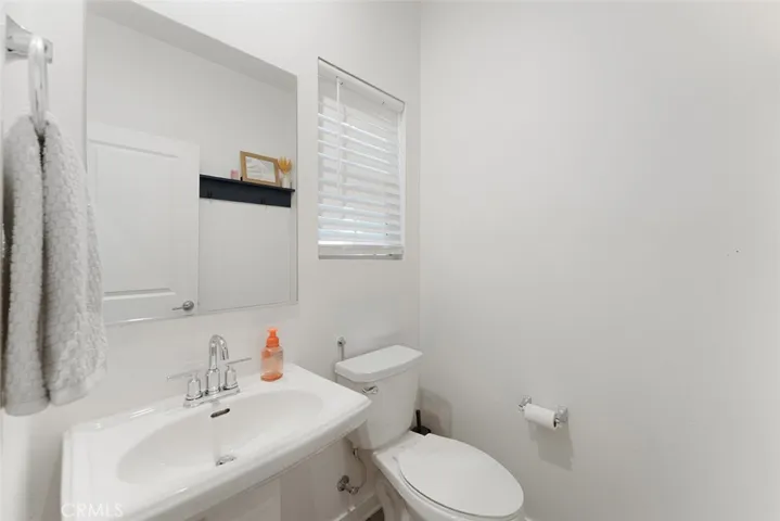 Lower level powder room.