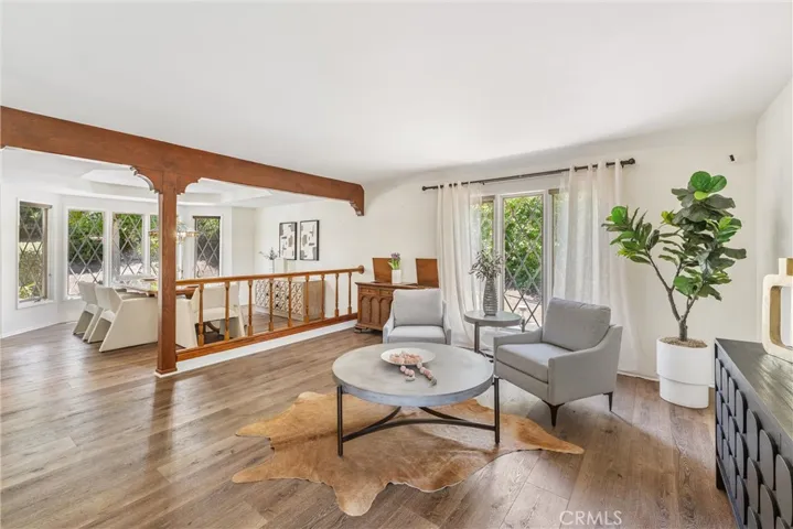 Living Room seating area overlooking formal dining room