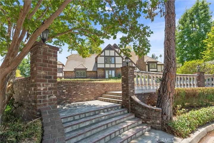 Steps up from the street to the front entry