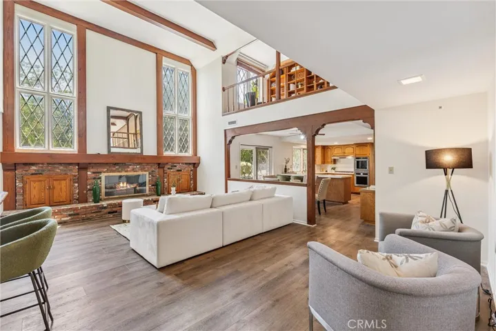 Sitting room opening into breakfast area and kitchen
