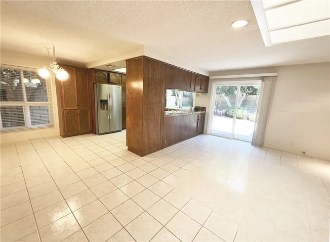 Great Room with casual dining are for a breakfast nook in the kitchen! A sliding door in the family room area with a view of the backyard and easy access to entertain "indoor and outdoor"!~ Perfect for summertime BBQ's~