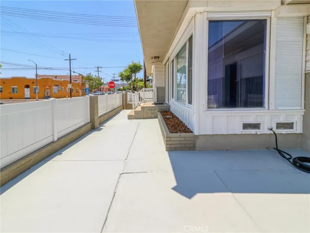 Spacious Patios in the front and around both sides of the property.