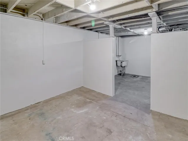 Partitioned Basement with Laundry Sink & power outlet (Prev Laundry area).