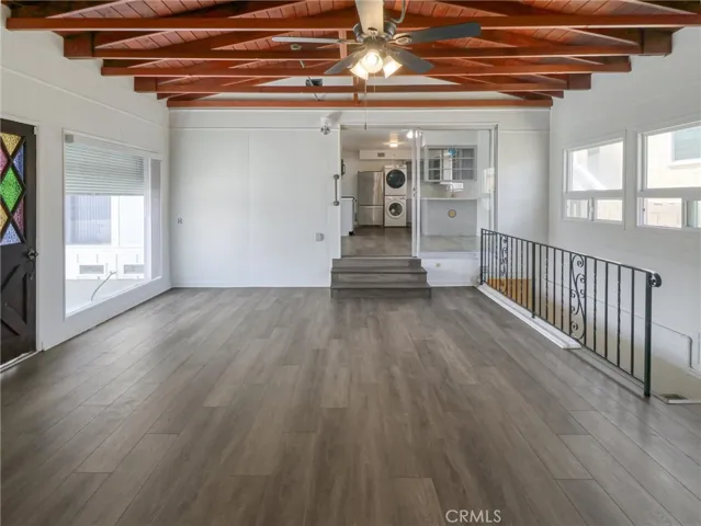 Family Room with open framed ceiling.
