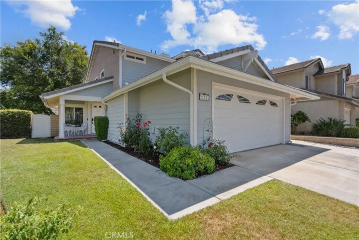 Charming Curb Appeal and ready for summer fun in your private pool and spa