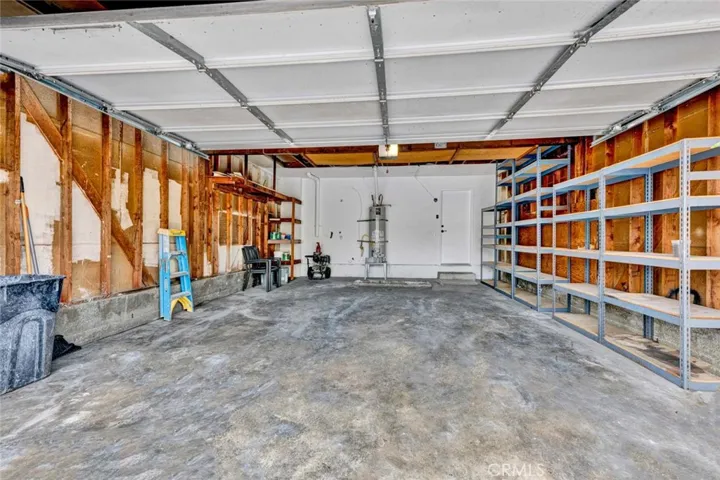Two car garage with direct access and laundry area